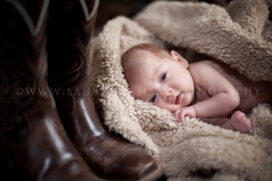 © All rights reserved, www.LauraAdamsPhotographicArt.com, 2015. Newborn cowgirl, Oakley Raven, photographed by Michigan professional photographer Laura Adams of Laura Adams Photographic Art, based in south east Michigan.  